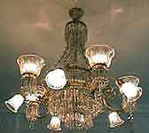 This original Gas-Electric Waterford crystal chandelier is shown in House & Garden's Feature article in 1911.